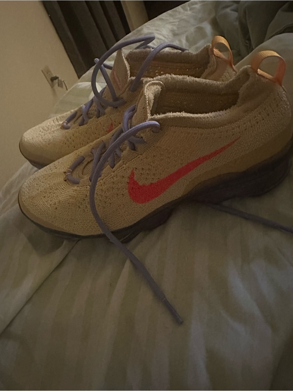 Nike Women’s Flyknit Athletic Shoe - Cream with Pink Swoosh and Purple Laces